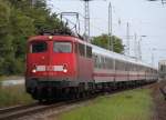 115 293-3 mit DZ 2680 von Warnemnde nach Berlin-Lichtenberg bei der Durchfahrt in Rostock-Bramow.17.06.2012 