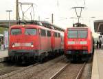 Pbz 115 350-1 mit 110 469-4 und daneben RE6 146 012 am 10.10.2012 in Bochum Hbf.