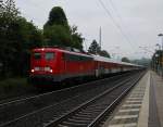 In aller Herrgotts-frühe kam am 30.05.2014 die 115 261-0 mit einem Autoreisezug in Fahrtrichtung Norden durch Wehretal-Reichensachsen.