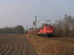 139 314-9 mit einem Gterzug zwischen Emden und Rheine bei Devermhlen (B 296.6) am 16-3-2012.