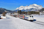 139 213 mit einem Turnuszug am 16.02.2019 bei Fieberbrunn. 