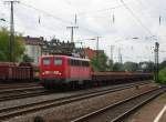 140 037-3 mit einem Flachwagenzug voll mit altem Schotter in Kln West. Aufgenommen am 02.09.2009.