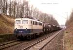 140694 am 19.3.1988 um 11.33 Uhr mit einem Güterzug Richtung Bremen im Einschnitt zwischen Vehrte und Ostercappeln.