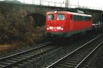 140 369-0 zieht im Mrz 2003 ihren Gterzug von Aachen Hbf nach Aachen-West und hat letzteres fast erreicht.