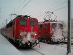141 430 - 9 und eine unbekannte 141 im Schneegestber. Aufgenommen im Bahnhof von Glckstadt an der Elbe. Leider wei ich im Moment das Datum nicht mehr. Mu aber so um 2004 herum sein.