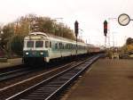 141 313-7 mit eine sehr bunte RB 65 24115 Emden-Rheine auf Bahnhof Salzbergen am 6-11-1999.