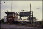 141431 auf der Hunte Klappbrücke in Oldenburg am 21.10.1989 um 12.31 Uhr mit dem E 3932 aus Bremen.