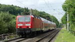 143 107 zieht einen RE20 (Limburg - Frankfurt) durch Lindenholzhausen. Aufgenommen am 19.6.2018 17:05