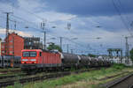 143 348, Köln West, 10.07.2021, Güterzug nach Neuss Gbf