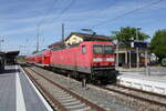 DB 143 591-6 mit dem RE 4886  Saale-Express  nach Halle (S) Hbf, am 09.05.2023 in Jena-Gschwitz.