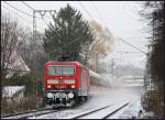 143 315-0 kmpft sich am Nachmittag des 23.11.2008 mit einem RE von Aalen nach Stuttgart durch´s Schneegestber.