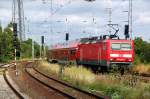 143 289 schiebt ihren RE nach Lutherstadt Wittenberg aus dem Bahnhof Biederitz. Fotografiert am 03.08.09. 