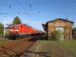 Mit einer RB am Haken macht sich 143 595-7 auf den Weg nach Leipzig Hbf. (Eilenburg am 5.10.2009)