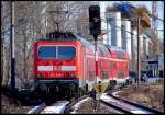 143 849-8 verlsst mit RE33209 (nach Sassnitz) den Bhf Stralsund Rgendamm.