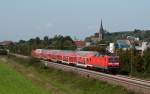 Anlsslich des Papstbesuches in Freiburg hat man sich aus allen Teilen der Republik Verstrkermaterial besorgt. So hatten 143 903 (Halle/Saale) und 143 185 (Erfurt) am 25. September 2011 die Ehre RB 26890 (Neuenburg(Baden) - Offenburg) [Sonderleistung] zu bespannen. Die Aufnahme entstand bei Teningen.