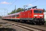 Die 143 557-7 zieht die RB von Itzehoe nach Hamburg in Pinneberg am 12.08.2012