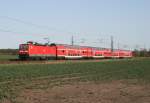 143 306 mit RE 18731 (Wnsdorf-Waldstadt–Dessau Hbf) am 10.04.2011 zwischen Wnsdorf-Waldstadt und Zossen