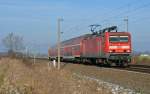 143 348 passiert mit einer RB aus Falkenberg(E) nach Leipzig am 07.02.15 Zschortau. Eine ehemalige Schleswig-Holsteiner Maschine, welche jetzt in Erfurt beheimatet ist, fährt Regionalzüge zwischen Sachsen und Sachsen-Anhalt.