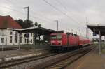 DB 143 871-2 mit der RB 26422 von Weißenfels nach Leipzig Hbf, am 30.07.2014 in Großkorbetha.