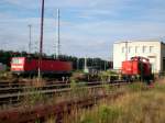 364-502 und eine 143 halten im Bahnhof von Sangerhausen Wochenendruhe. Aufgenommen am 28.06.2008