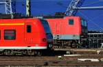 425 596-4 und 143 336-6 bei der Einfahrt in den Klner Hbf - 10.10.2010