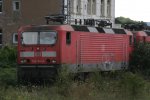 Schrottlok 143 164 steht am 19.8.11 ausgemustert in Trier Hbf.Aus dem Zug fotografiert!!!