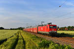 143 020 mit einem Autozug am 24.05.2018 bei Rohrsen.