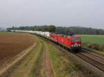 Die MEG 601 und die MEG 704 mit einem Zementzug am 08.10.2013 unterwegs bei Dettenhofen.