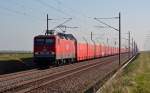 143 851 alias Lok 603 der MEG schleppte am 15.04.15 einen Autozug durch Braschwitz Richtung Halle(S).
