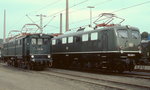 Zwei Generationen Güterzuglokomotiven auf der großen Ausstellung zum 150-jährigen Jubiläum der deutschen Eisenbahnen im Oktober 1985 in Bochum-Dahlhausen: Die in den 1920er Jahren konstruierte E 91 99, die noch bis in die 1970er Jahre eingesetzt wurde, und die damals noch unentbehrliche 150 089-1