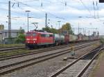 151 015-5 zieht einen Containerzug am 06.10.2011 durch Schwetzingen    