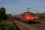 151 108-8 mit einem Kesselwagenzug in Dsseldorf-Rath am 29.09.2011