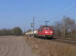 151 168-2 mit einem Gterzug zwischen Emden und Rheine bei Devermhlen (B 296.6) am 23-3-2012.