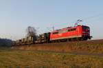 151 041 DB Schenker ist am 11.03.2014 mit einem Militärtransport bei Haßlach in Richtung Kronach unterwegs.