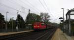 151 035-3 DB kommt durch Kohlscheid aus Richtung Aachen-West mit eienem langen Kalkzug aus Yves-Gomezée(B) nach Millingen und fährt Richtung Herzogenrath,Neuss. Bei Regenwolken am Morgen vom 29.10.2014.