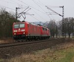 Ein kleiner Lokzug bestehend aus 185 008-0, 151 062-7 und 145 027-9 befand sich am 11.02.2015 auf der Fahrt gen Süden. Aufgenommen bei Niederhone.