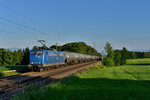 151 118 mit einem Kesselzug am 07.07.2016 bei Hilperting. 