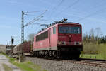 21. April 2015, Ein gemischter Güterzug, gezogen von Lok 155 148, fährt bei Johannisthal in Richtung Saalfeld.