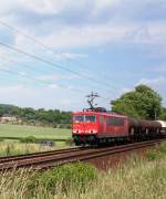 155 194 zieht einen gemischten Gterzug Richtung Nordhausen/Kassel und wird hier gleich die ehemalige Blockstelle Gonna unweit von Sangerhausen passieren. 19.06.2008