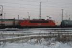 155 131-6 schleicht am 26.01.2010 durch Angermnde und fhrt kurze Zeit spter mit 232 240-2 & 232 498-6 am Haken in Richtung Berlin.