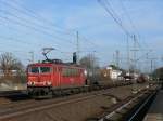 RAILION Logistics 155 237 mit einem gemischten Güterzug bei Durchfahrt durch Schwarzenbek in Richtung Hamburg, 23.03.2011
