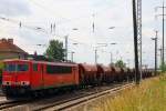 155 210-8 am 07. Juni 2011 vor einem Ganzzug offener Schttgutwagen in Richtung Bahnhof Berlin Schnefeld Flughafen