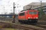 155 183-7 von Railion rangiert in Aachen-West bei Regenwolken am 24.2.2012.