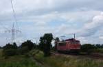 155 202-5 fuhr am 17.07.2012 als Lokzug von Emden nach Drpen, hier sdlich von Leer.