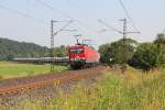 143 204 (MEG 602) und 155 195 (MEG 704) mit Zementzug in Fahrtrichtung Süden.