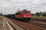 Hier 155 095-3 mit einem Güterzug, bei der Durchfahrt am 28.6.2014 durch Berlin Schönefeld Flughafen, in Richtung Genshagener Heide.