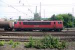 155 035-9 von Railion fährt mit einem langen Kesselzug aus Antwerpen-BASF(B) nach Ludwigshafen-BASF bei der Ausfahrt aus Aachen-West und fährt in Richtung Aachen-Schanz,Aachen-Hbf,Köln.