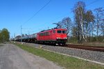 Die 155 157-1 mit einem Kesselwagenzug am 21.04.2016 in Nassenheide.