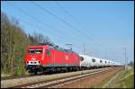 MEG 801 mit einem Zementumleiter von Rdersdorf nach Rostock-Seehafen am 28.04.2009 in Martensdorf.