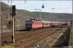Die in DR-Lack erhaltene 180 009 braust am 15.03.08 mit einem Autozug aus Tschechien durch den ehem. Gbf Knigstein.